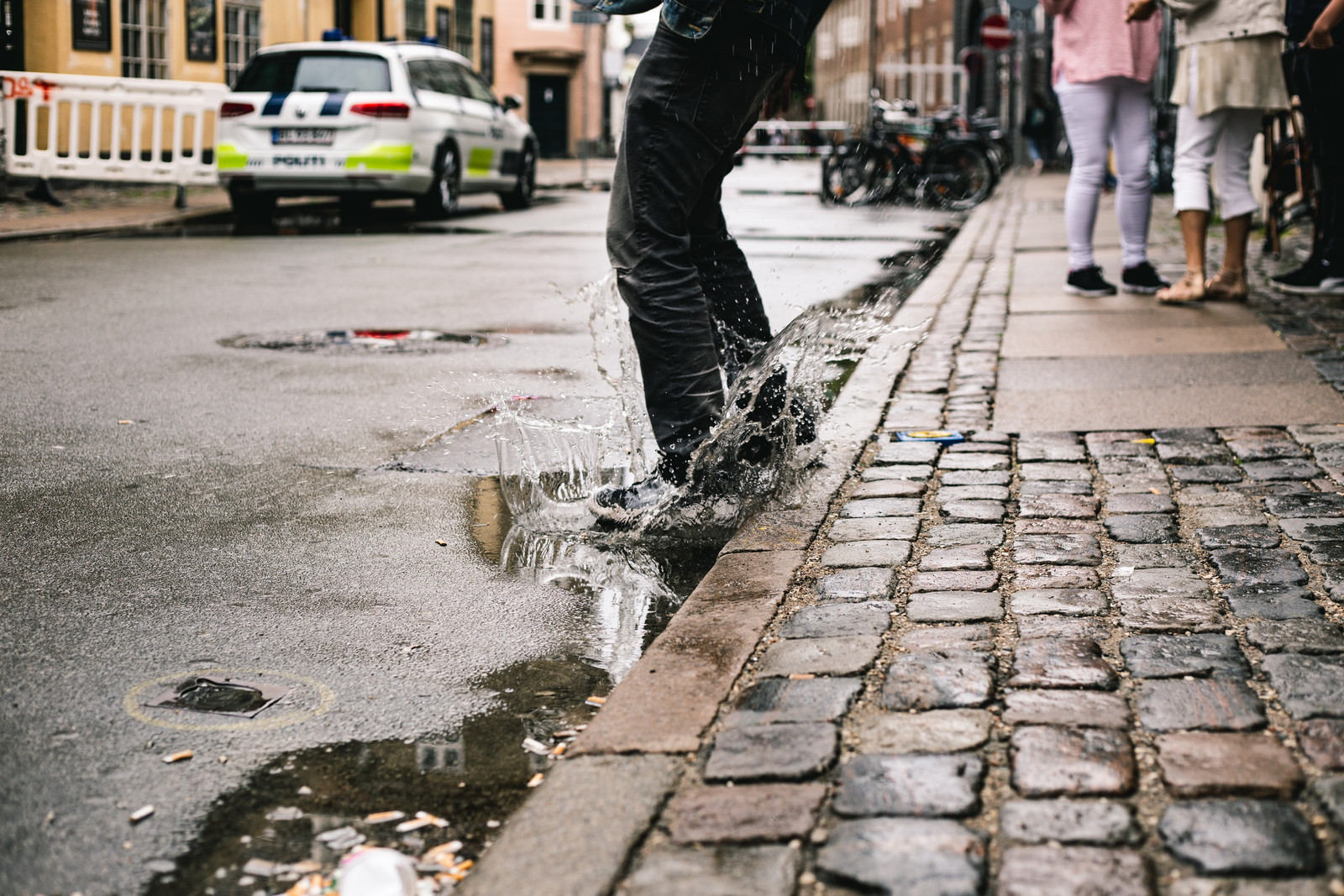 stranger-jumping-in-puddle-1